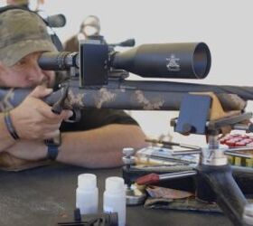 The author taking his first-ever shot from a muzzleloader.