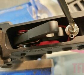 The SOCOM trigger is easily adjusted. On the fly, a coin works as well.