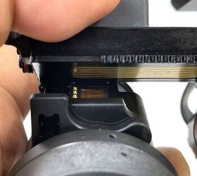 See the pins just below the power rails? To the left is the square protrusion that houses the spring-loaded teeth. See how far away it is from the matching teeth on the bridge?