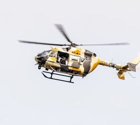A sniper takes a shot from a UH-72 Lakota during the European Best Sniper Team Competition at the Hohenfels Training Area, Germany, Aug. 6, 2022.  The annual European Best Sniper Team Competition is a U.S. Army Europe and Africa competition that tests marksmanship skills, physical prowess, and mental agility while developing relationships and sharing skills between sniper teams across Europe. (U.S. Army photo by Staff Sgt. Dana Clarke)