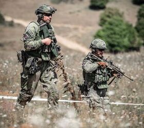 A team of Finnish soldiers participate in the European Best Sniper Team Competition at the Hohenfels Training Area, Germany, Aug. 7, 2022.  The annual European Best Sniper Team Competition is a U.S. Army Europe and Africa competition that tests marksmanship skills, physical prowess, and mental agility while developing relationships and sharing skills between sniper teams across Europe. (U.S. Army photo by Staff Sgt. Dana Clarke)