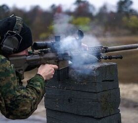 U.S Marine Corps Staff Sgt. Jason Florczyk, a reconnaissance Marine with 2d Reconnaissance Battalion, 2d Marine Division, fires an M110 Semi-Automatic Sniper System on a sniper range during Exercise Caribbean Urban Warrior on Camp Lejeune, North Carolina, March 12, 2023. Exercise Caribbean Urban Warrior is a bilateral training evolution designed to increase global interoperability between 2d Marine Division and Marine Squadron Carib. (U.S. Marine Corps photo by Lance Cpl. Eric Dmochowski)