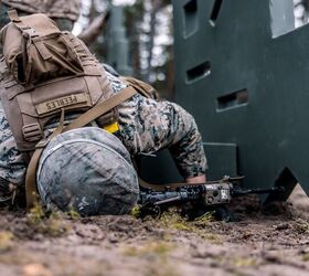 U.S. Marine Corps Cpl. Lane Peebles, a combat engineer with Combat Logistics Battalion 6 (CLB-6), Combat Logistics Regiment 2, 2nd Marine Logistics Group, fires a M4A1 rifle during a barricade range in preparation for exercise Freezing Winds 22 in Syndalen, Finland, Oct. 11, 2022. Task Force Red Cloud, headquartered by elements of CLB-6, is deployed to Finland in support of Exercises SYD 2022 and Freezing Winds 2022 to enhance U.S. and Finnish select interdependence in the maritime domain; solidify bilateral maritime maneuver within the Finnish littoral environment; and foster strong relationships between U.S. Marine Corps and Finnish Defense Force sustainment units. (U.S. Marine Corps photo by Cpl. Meshaq Hylton)