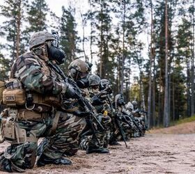 U.S. Marines with Combat Logistics Battalion 6 (CLB-6), Combat Logistics Regiment 2, 2nd Marine Logistics Group, take a knee during a Chemical, Biological, Radiological and Nuclear (CBRN) range.