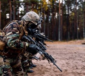 U.S. Marine Corps Gunnery Sgt. Brian Smith, a Chemical, Biological, Radiological and Nuclear (CBRN) defense chief with Combat Logistics Battalion 6 (CLB-6), Combat Logistics Regiment 2, 2nd Marine Logistics Group, loads a M4A1 during a CBRN range in preparation for exercise Freezing Winds 22 in Syndalen, Finland, Oct. 11, 2022. Task Force Red Cloud, headquartered by elements of CLB-6, is deployed to Finland in support of Exercises SYD 2022 and Freezing Winds 2022 to enhance U.S. and Finnish select interdependence in the maritime domain; solidify bilateral maritime maneuver within the Finnish littoral environment; and foster strong relationships between U.S. Marine Corps and Finnish Defense Force sustainment units. (U.S. Marine Corps photo by Cpl. Meshaq Hylton)