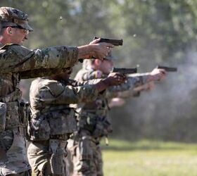 U.S. Army Sgt. Bailey Ruff, a horizontal construction engineer assigned to the South Dakota Army National Guard, representing Region VI, fires his SIG Sauer M17 pistol on the Georgia Range at Ft. Greely Alaska , during the Army National Guard Best Warrior Competition, July 11, 2023. The Army National Guard Best Warrior Competition tests the adaptiveness and lethality of our forces. National Guard Citizen-Soldiers remain ready and resilient to meet the nation's challenges. (U.S. Army photo by Sgt. Seth LaCount)