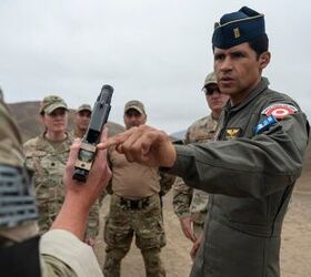 Coronel Fidel Castro of the Fuerza Aerea del Peru receives a weapons demonstration from U.S. special forces teams during Resolute Sentinel 23 in Lima, Peru, July 9th, 2023. The Western Hemisphere is our shared home, and, even during peacetime, it's critical that our military forces practice these skills with our partners so that in the future we can quickly work together in a crisis. (U.S. Air Force photo by Tech. Sgt. Shawn White)