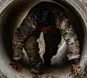 7th Special Forces Group (Airborne) Soldier runs through an obstacle during the Fuerzas Commando tryouts on Camp 'Bull' Simons, Fla., April 13, 2022. The overall competition promotes military-to-military relationships, increases mission readiness, and improves regional security.
(U.S. Army photo by Spc. Christopher Sanchez)