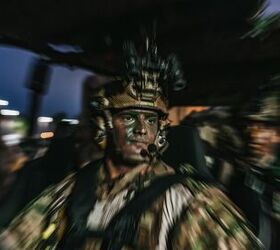 A U.S. Marine assigned to Reconnaissance Company, 15th Marine Expeditionary Unit, rides in a Polaris MRZR enroute to a raid site during the ground interoperability exercise at Marine Corps Base Camp Pendleton, California, July 24, 2023. The ground interoperability training integrates Reconnaissance Company and supporting elements into a raid force to conduct land-based, specialized limited-scale raids in preparation for more complex amphibious and maritime operations. (U.S. Marine Corps photo by Cpl. Joseph Helms)