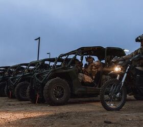 U.S. Marines assigned to Reconnaissance Company, 15th Marine Expeditionary Unit, and British Royal Marines Commandos assigned to 40 Commando, currently attached to the 15th MEU, prepare to depart for a raid during the ground interoperability exercise at Marine Corps Base Camp Pendleton, California, July 24, 2023. The ground interoperability training integrates Reconnaissance Company and supporting elements into a raid force to conduct land-based, specialized limited-scale raids in preparation for more complex amphibious and maritime operations. (U.S. Marine Corps photo by Cpl. Joseph Helms)