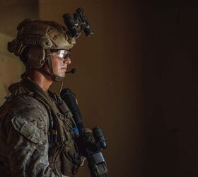 A U.S. Marine assigned to Reconnaissance Company, 15th Marine Expeditionary Unit, holds security as part of a raid during the ground interoperability exercise at Marine Corps Base Camp Pendleton, California, July 19, 2023. The ground interoperability training integrates Reconnaissance Company and supporting elements into a raid force to conduct land-based, specialized limited-scale raids in preparation for more complex amphibious and maritime operations. (U.S. Marine Corps photo by Cpl. Joseph Helms)