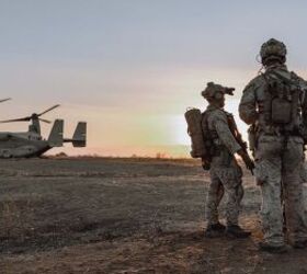 U.S. Marines assigned to Reconnaissance Company, 15th Marine Expeditionary Unit, prepare to board an MV-22B Osprey attached to Marine Medium Tiltrotor Squadron (VMM) 165 (Reinforced), 15th MEU, before a raid during the ground interoperability exercise at Marine Corps Base Camp Pendleton, California, July 20, 2023. The ground interoperability training integrates Reconnaissance Company and supporting elements into a raid force to conduct land-based, specialized limited-scale raids in preparation for more complex amphibious and maritime operations. (U.S. Marine Corps photo by Cpl. Joseph Helms)