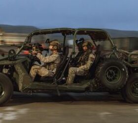 U.S. Marines assigned to Reconnaissance Company, 15th Marine Expeditionary Unit, and British Royal Marine Commandos assigned to 40 Commando, currently attached to the 15th MEU, drive a Polaris MRZR to a raid during the ground interoperability exercise at Marine Corps Base Camp Pendleton, California, July 24, 2023. The ground interoperability training integrates Reconnaissance Company and supporting elements into a raid force to conduct land-based, specialized limited-scale raids in preparation for more complex amphibious and maritime operations. (U.S. Marine Corps photo by Cpl. Joseph Helms)