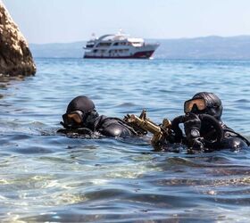 A member of the Croatian Zapovjednistvo Specialjalnih Snaga (ZSS) and a member of U.S. Naval Special Warfare Task Unit Europe (NSWTU-E) conduct an over the beach (OTB) exercise in Split, Croatia, April 15, 2022. For the Croatian ZSS, Joint Combined Exchange Training, or JCET with partner nations is not uncommon. The ZSS were founded in 2000 as the Special Operations Battalion and since then, its operators have participated in multiple operations, including stints in Afghanistan as part of NATO's International Security Assistance Force (ISAF). (U.S. Army photo by Sgt. Patrik Orcutt)