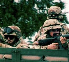 American and U.N. soldiers patrol Oct. 13, 1993, in southern Mogadishu, Somalia. (Hocine Zaourar/AFP/Getty Images)