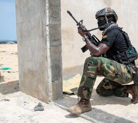 A member of the Ghana Armed Forces pulls security after taking over the objective. (U.S. Army photo by Staff Sgt. Charles Brock)