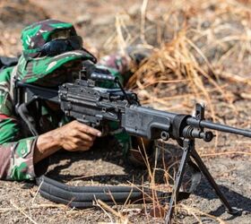 An Indonesian Soldier (TNI) pulls security with his M249 machine gun during Exercise Super Garuda Shield.