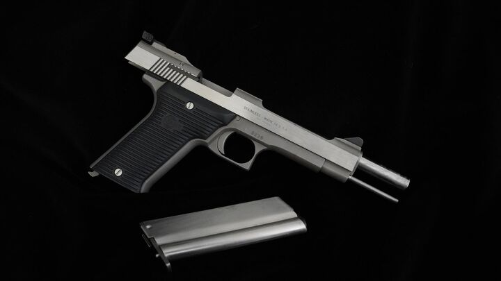 AMT Automag II semi-auto pistol, .22 Rimfire cal., 6 barrel, stainless steel, b AMT Automag II semi-auto pistol, .22 Rimfire cal., 6 barrel, stainless steel, b