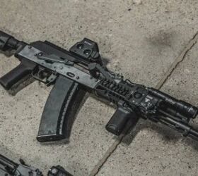 AK 74 with the laser mounted on the side of the handguard. The image belongs to Haley Strategic