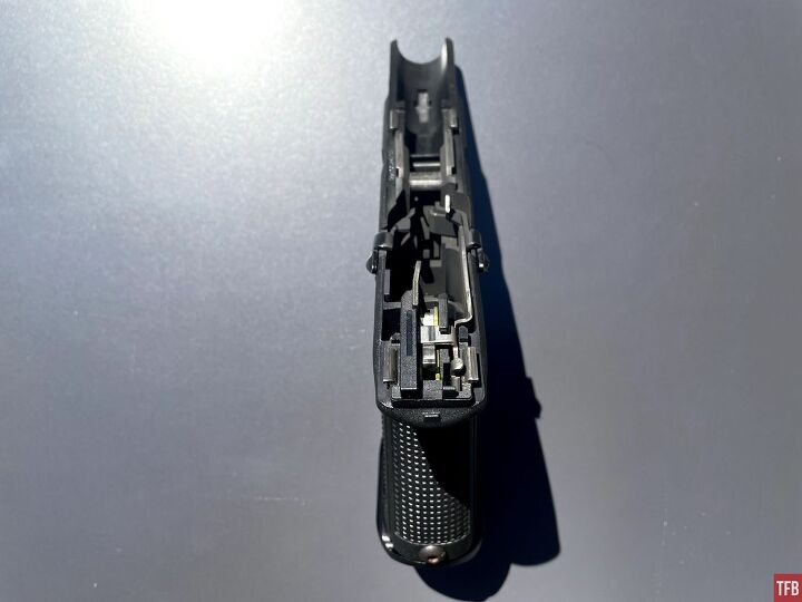 A top-down view of the Timney Alpha sear installed in a Glock frame