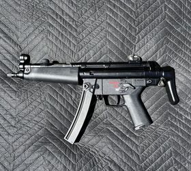 My MP5 clone. The Magpul SL grip module was color-filled with acrylic paint.