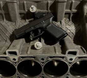 tfb review meprolight mpo f open emitter pistol sight, Meprolight MPO F balancing on top of a custom milled Glock 19