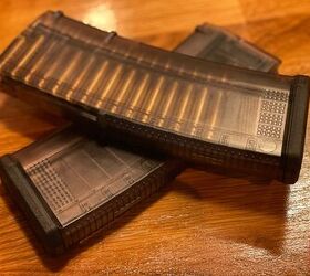tfb review magpul tmag 30 magazines translucent olive drab hue, The TMAG 30 AR M4 GEN M3 is a translucent 30 round magazine designed for STANAG compatible firearms chambered in 5 56x45 NATO 223 Remington The front and rear straps are ribbed to provide a secure grip during magazine changes while the smooth sides are there to enhance visibility for quick round assessment
