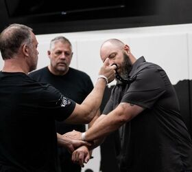 I was getting a lesson on the application of a karambit. A buddy of mine makes them, and I honestly always thought they were gimmicky toys you’d find next to ninja stars in a mall knife and sword shop. But they are surprisingly effective in the right hands.