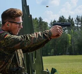 A German soldier assigned to the 3rd Panzer Battalion participates in the Combat Pistol Shoot event during the Strong Europe Tank Challenge, June 5, 2018.(U.S. Army photo by Spc. Rolyn Kropf)