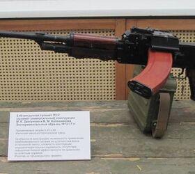 project poplin soviet request for a better 5 45 light machine gun, PU 2 dual feed light machine gun features a top folding stock Photo credit unknown