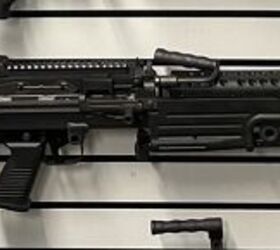 saw program the xm106 automatic rifle, M249 Photo by Lynndon Schooler