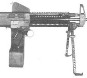 6mm to 5 56mm saw program the lightweight xm235, XM235 with an earlier ammunition box situated to balance the weapon Photo source Wikimedia Commons