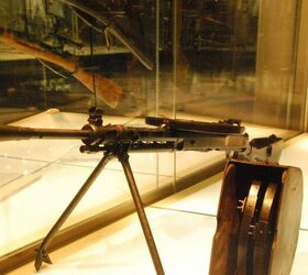 lad 7 62x25 belt fed submachine gun, DP 27 7 62x54 light machine gun with three 47 round pan magazines at the Tula Arms Museum Photo by Lynndon Schooler