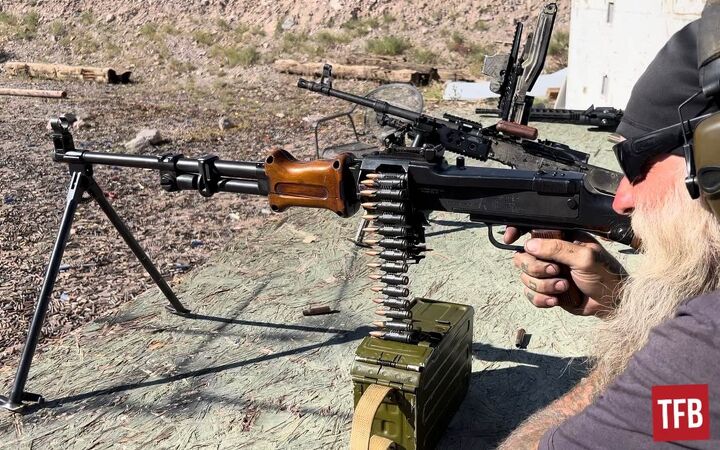 Out testing weapons, including an RPD 7.62x39 light machine gun. Photo by Lynndon Schooler.