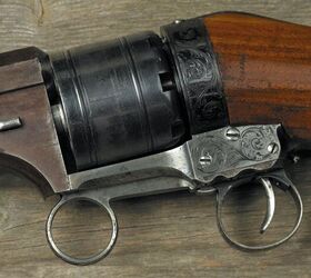 wheelgun wednesday revolving carbines the first modern repeaters, That ring lever works the action as the hammer has no external spur unlike most Colt revolvers