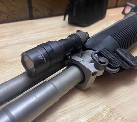 Closer look at the front sling mount and flashlight mount.