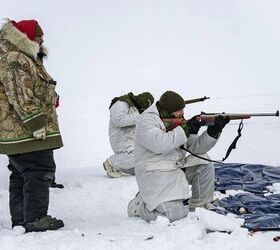 canada s arctic rangers need expensive rifle stock repairs, The Arctic Rangers now use the C19 rifle in the foreground after using the Lee Enfield since 1947 seen in the background Department of National Defense