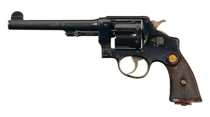 wheelgun wednesday s w model 1917 the goat military revolver, This Smith Wesson Hand Ejector in 455 Webley was sent to Canadian troops in World War I it is very similar to the Model 1917 revolver and the Canucks used these handguns again in World War II as well RIA sold this example back in 2020 Rock Island Armory