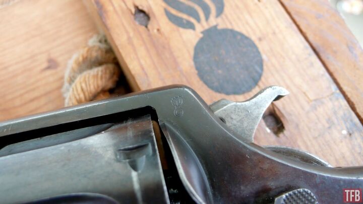 wheelgun wednesday s w model 1917 the goat military revolver, That bomb insignia shows this revolver s acceptance by the U S military Doug E