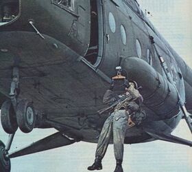 the stg 44 in post war yugoslavia, JNA paratrooper being hoisted into a HIP helicopter Photo credit Jugoslovenska Narodna Armija