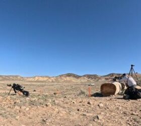 In the team match, one person shoots while the other spots.