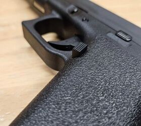 Magazine release with sharp edges