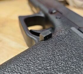Magazine release with smoothed-off edges