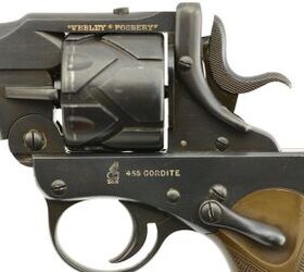 wheelgun wednesday auto or revolver why not both, That lever beside the hammer unlocked the break top action that s a safety lever right over the grip Joe Salter