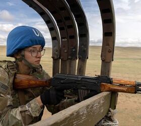 POTD: Convoy Duty in the Mongolian Steppes