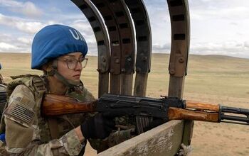 POTD: Convoy Duty in the Mongolian Steppes