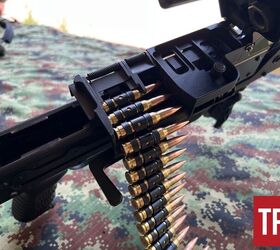 Showing the belt loaded under the cartridge guides. By Lynndon Schooler.
