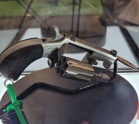 wheelgun wednesday fifty years of hideout guns, Although their original designs were very basic and required you to remove the cylinder to eject empties North American Arms now offers swing out cylinders and top breaks You can also buy revolvers with both a 22LR and 22 Magnum cylinder Zac K