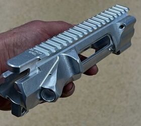 spuhrs new ar upper with patent pending fitment solution, Note also the rounded Picatinny rails