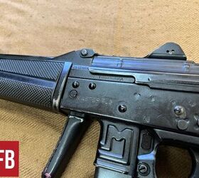 yugoslavias compact 9mm submachine gun the zastava master flg, Master FLG markings and note the metal handguard By Lynndon Schooler
